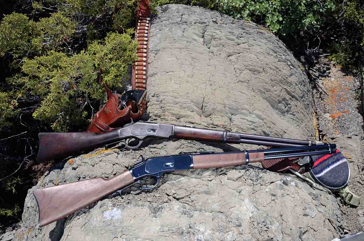 The new Winchester Model 1873 SRC (front) is shown with an original from the 1890s.